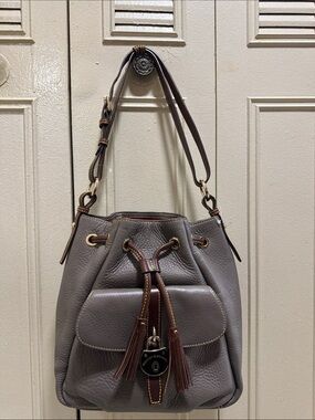 Dooney & Bourke Samba Drawstring Bag in gray.  (Retail $498) NWOT